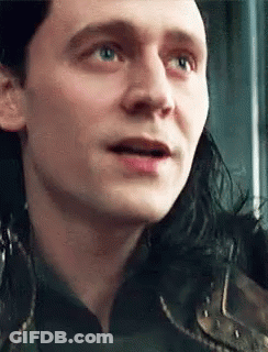 A Close Up Of A Man 'S Face With A Surprised Expression On His Face . GIF