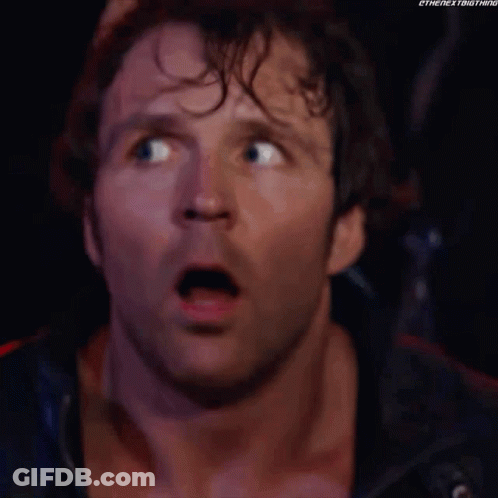 A Close Up Of A Man 'S Face With A Surprised Look On His Face And His Mouth Open . GIF