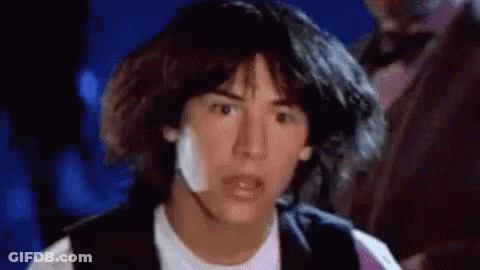 A Close Up Of A Man 'S Face With A Surprised Look On It . GIF