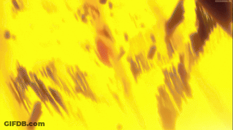 A Close Up Of A Man 'S Face With A Sword In His Hand GIF