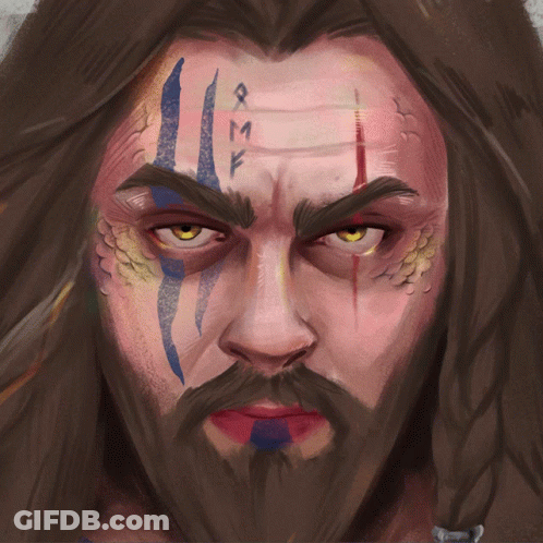 A Close Up Of A Man 'S Face With A Tattoo On His Forehead GIF