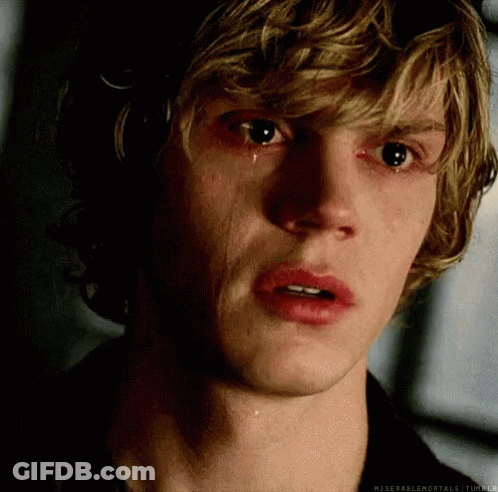 A Close Up Of A Man 'S Face With A Tear Coming Out Of His Eye GIF