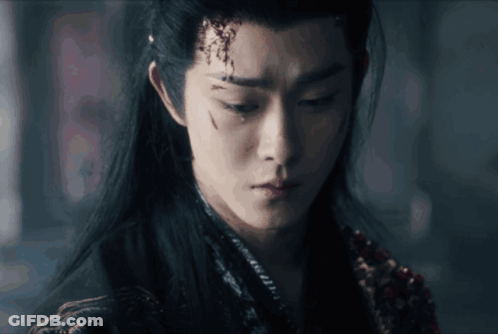 A Close Up Of A Man 'S Face With A Tear Coming Out Of His Eye GIF
