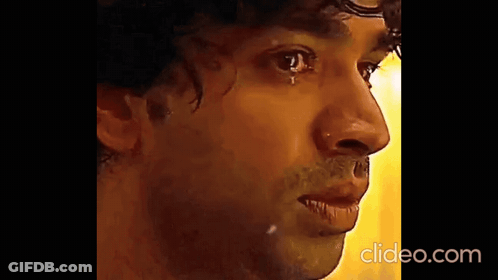 A Close Up Of A Man 'S Face With A Tear Running Down His Eye . GIF
