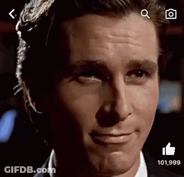 A Close Up Of A Man 'S Face With A Thumbs Up Sign . GIF