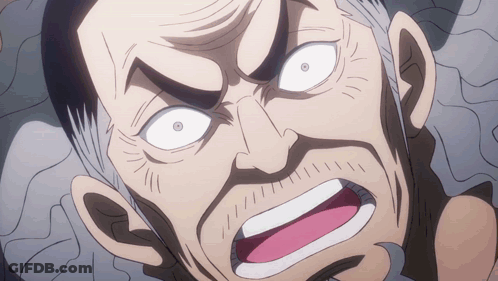 A Close Up Of A Man 'S Face With A Very Angry Look On His Face GIF