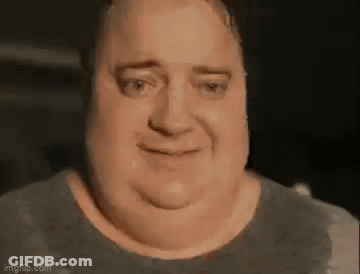 A Close Up Of A Man 'S Face With A Very Fat Neck And A Smile On His Face . GIF