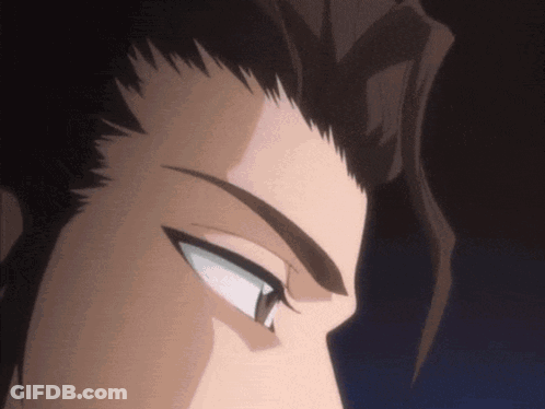A Close Up Of A Man 'S Face With A Very Serious Look On His Face GIF