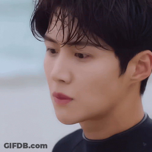 A Close Up Of A Man 'S Face With A Wet Hair GIF