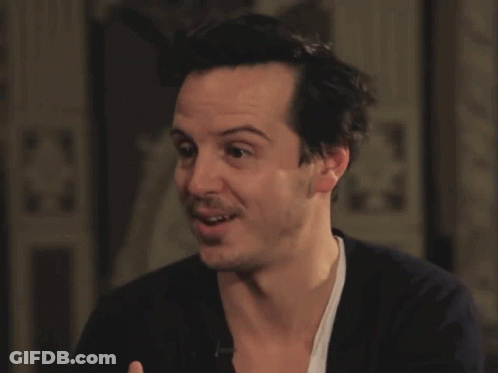 A Close Up Of A Man 'S Face With A White Shirt On GIF