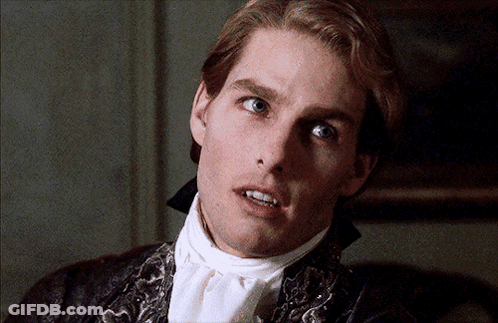 A Close Up Of A Man 'S Face With A White Tie GIF