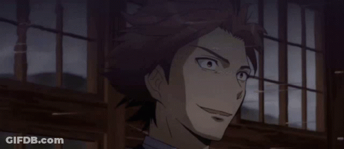 A Close Up Of A Man 'S Face With A Window Behind Him GIF