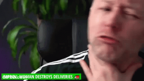 A Close Up Of A Man 'S Face With A Woman 'S Hand On It . GIF
