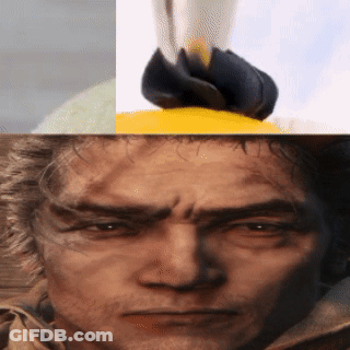 A Close Up Of A Man 'S Face With A Yellow Object On Top Of It GIF
