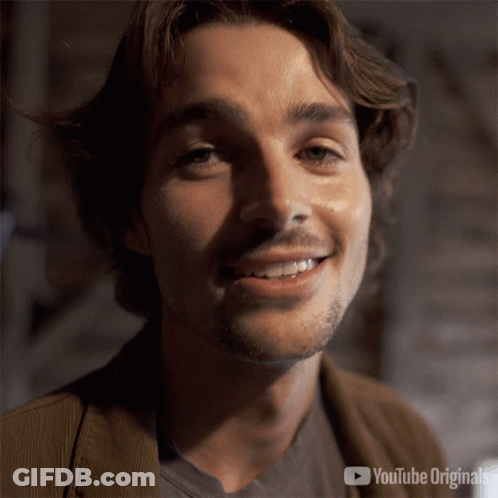 A Close Up Of A Man 'S Face With A Youtube Originals Logo Behind Him GIF