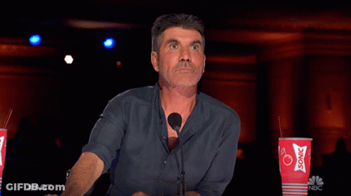 A Close Up Of A Man 'S Face With #Agt Written On The Bottom Right GIF