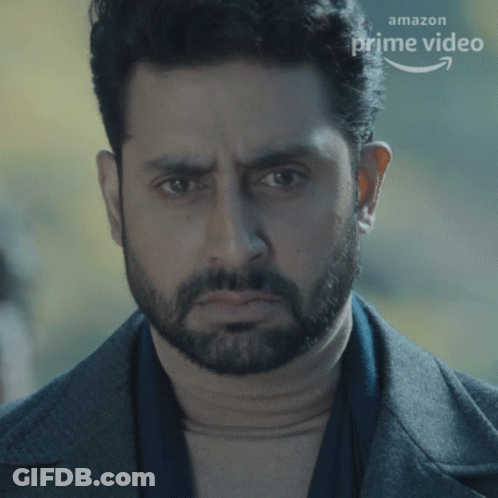 A Close Up Of A Man 'S Face With An Amazon Prime Video Arrow GIF
