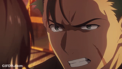 A Close Up Of A Man 'S Face With An Angry Expression GIF