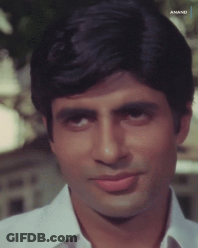 A Close Up Of A Man 'S Face With Anand Written On The Bottom Right GIF