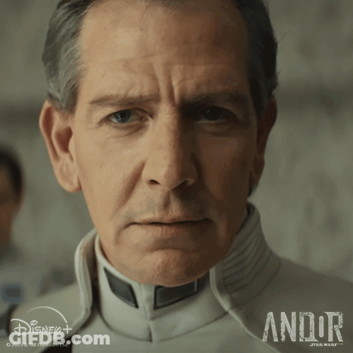 Close Up Of Man's Face Andor Star Wars Text GIF