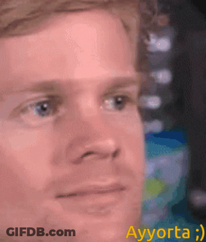 A Close Up Of A Man 'S Face With Ayyorta Written Below GIF
