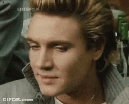 A Close Up Of A Man 'S Face With Bbc Four Written On The Bottom Right GIF