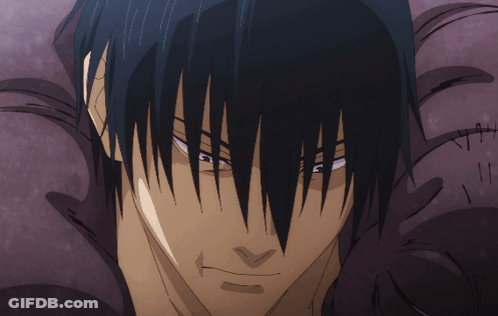 A Close Up Of A Man 'S Face With Black Hair GIF
