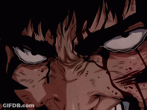 A Close Up Of A Man 'S Face With Blood Coming Out Of His Eyes GIF