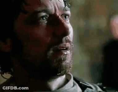 A Close Up Of A Man 'S Face With Blood Coming Out Of His Mouth . GIF