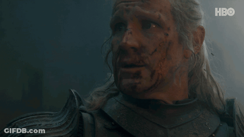 A Close Up Of A Man 'S Face With Blood Coming Out Of It . GIF