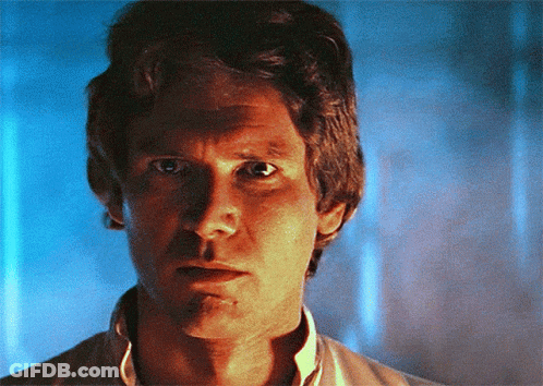 A Close Up Of A Man 'S Face With Blue Background GIF