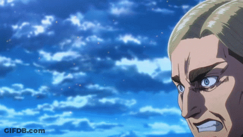 A Close Up Of A Man 'S Face With Blue Eyes Against A Blue Sky GIF