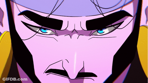 A Close Up Of A Man 'S Face With Blue Eyes And A Mustache GIF