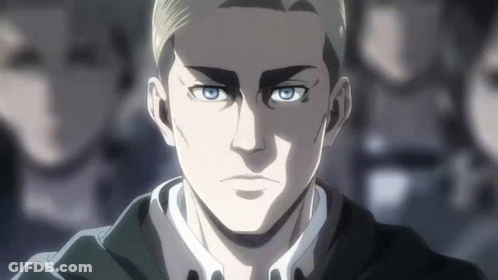 A Close Up Of A Man 'S Face With Blue Eyes In A Crowd Of People . GIF