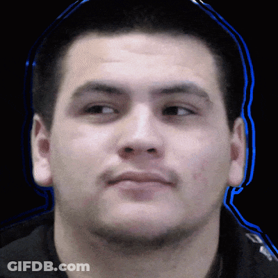 A Close Up Of A Man 'S Face With Blue Lines Around His Head GIF