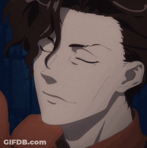 A Close Up Of A Man 'S Face With Closed Eyes GIF