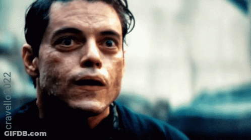 A Close Up Of A Man 'S Face With Crawling 032 Written In The Corner GIF