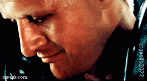 A Close Up Of A Man 'S Face With Crawling2002 Written Below It GIF