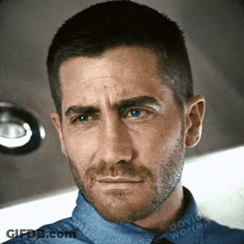 A Close Up Of A Man 'S Face With David Worren Written On The Bottom Right GIF