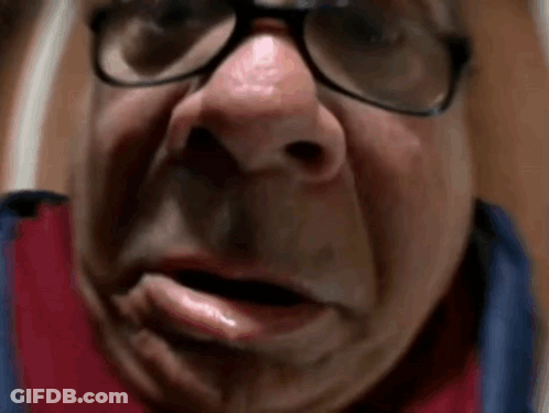 A Close Up Of A Man 'S Face With Glasses And A Fake Nose . GIF