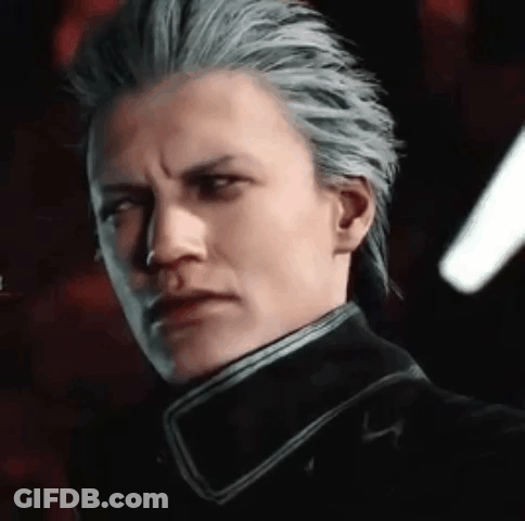 A Close Up Of A Man 'S Face With Gray Hair And A Black Jacket . GIF