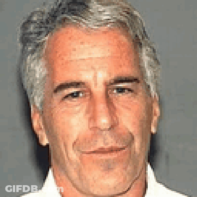 A Close Up Of A Man 'S Face With Gray Hair And A White Shirt GIF