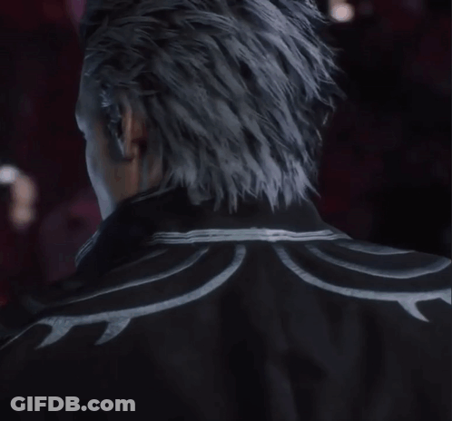 A Close Up Of A Man 'S Face With Gray Hair GIF