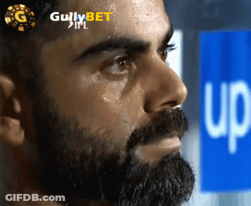 A Close Up Of A Man 'S Face With Gullybet Ipl Written On The Top GIF