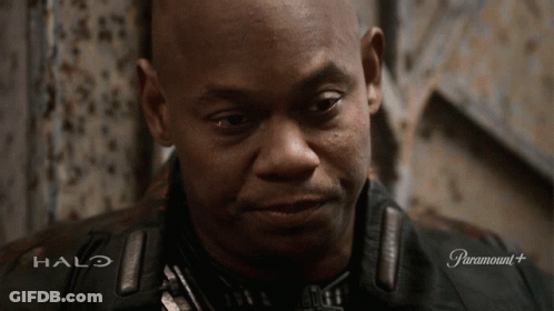 A Close Up Of A Man 'S Face With Halo On The Bottom GIF