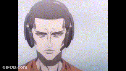 A Close Up Of A Man 'S Face With Headphones On His Head . GIF