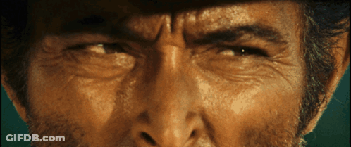 A Close Up Of A Man 'S Face With His Eyes Closed GIF