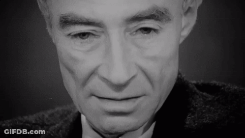 A Close Up Of A Man 'S Face With His Eyes Closed GIF