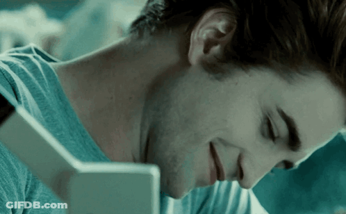 A Close Up Of A Man 'S Face With His Eyes Closed GIF