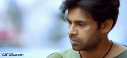 A Close Up Of A Man 'S Face With His Eyes Closed GIF